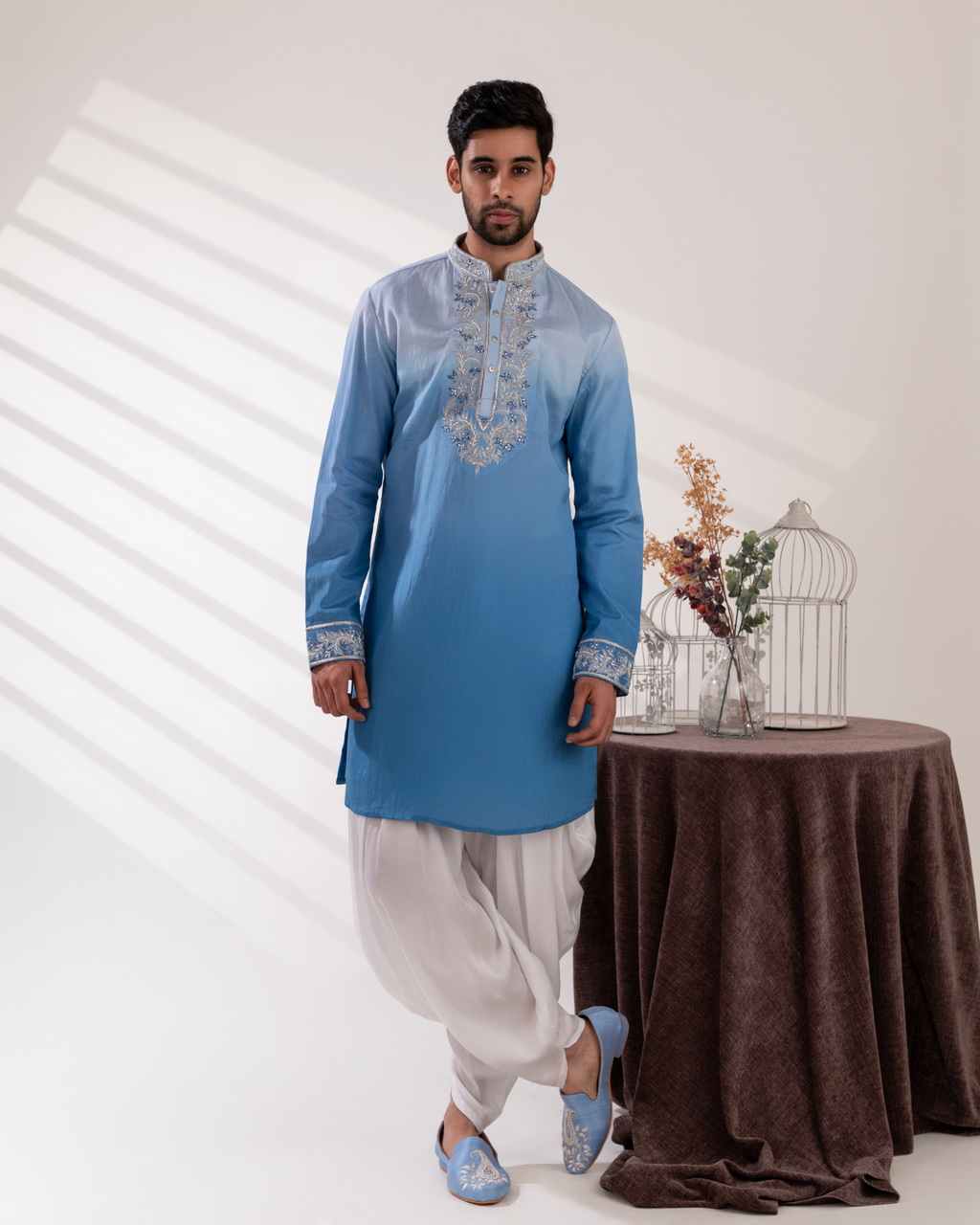 Frontal shot highlighting the blue gradient and structured kurta fall.