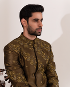 Close-up of botanical embroidery on the sherwani.