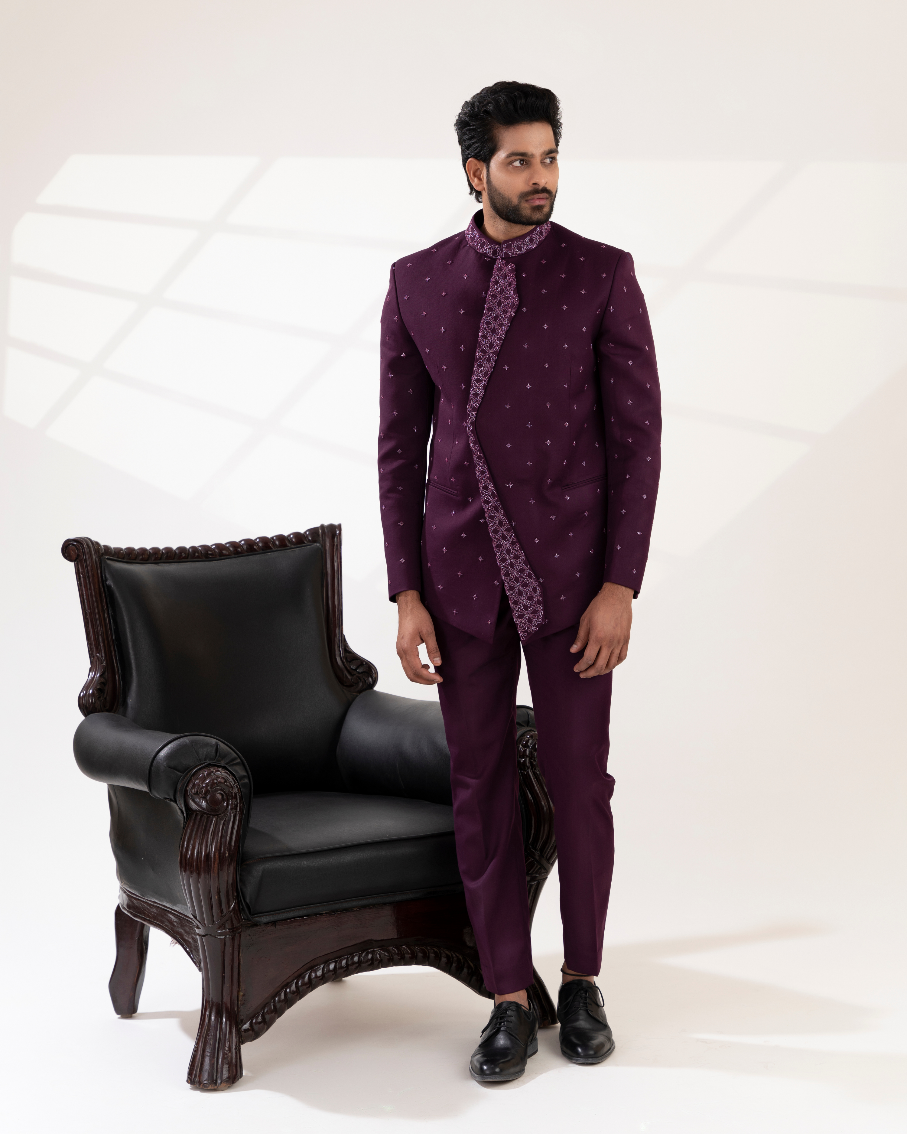 Front view of a wine bandhgala with straight fit pants