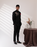Side profile highlighting black bandhgala paired with pants