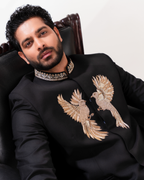 Close-up of bird motifs in gold embroidery on bandhgala