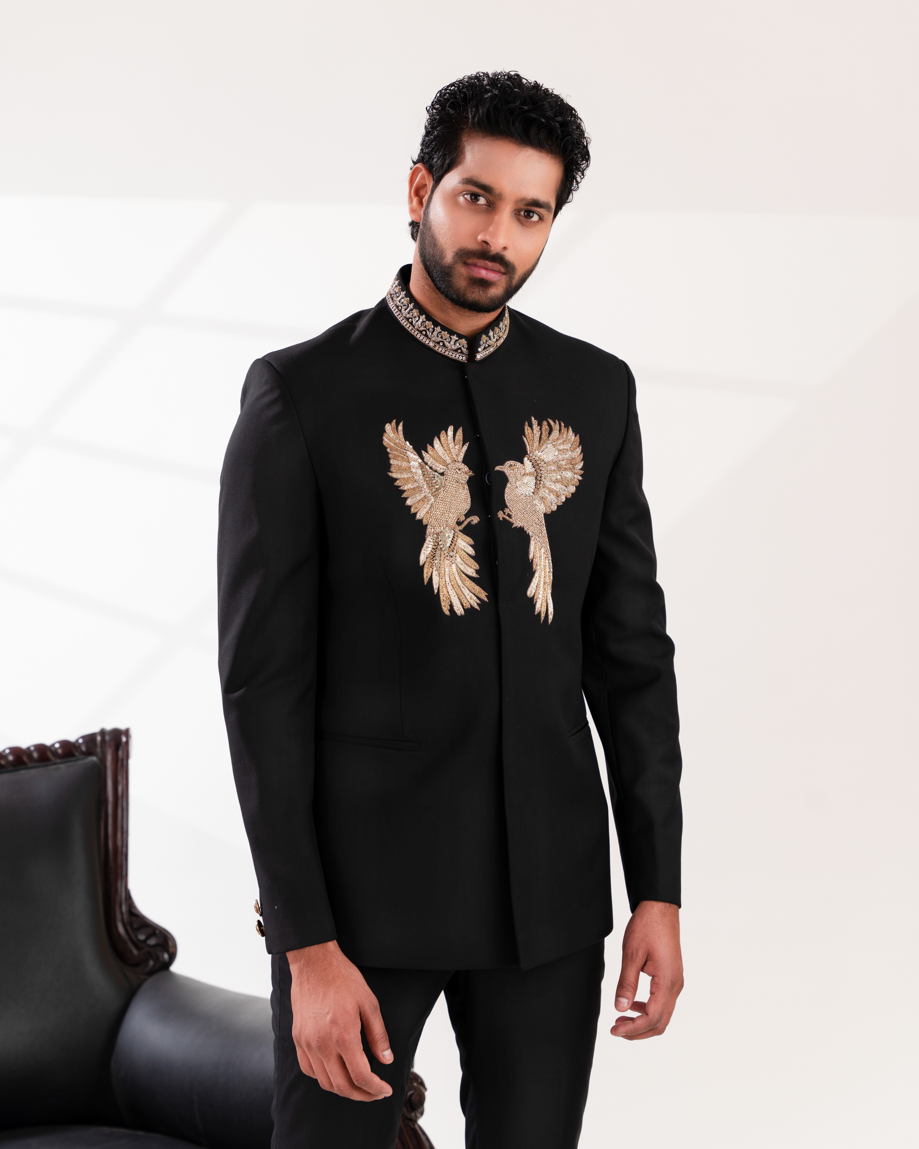 Man wearing a black embroidered bandhgala jacket 