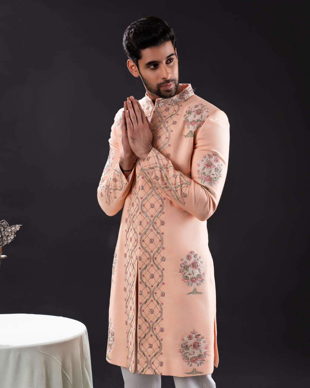 Side view showing sherwani cut and embroidery placement.