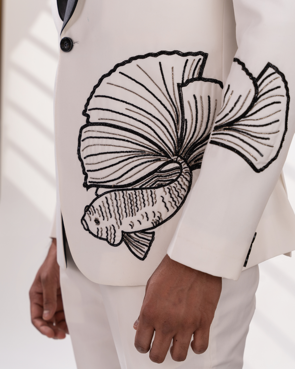 White tuxedo with black fish design embroidery