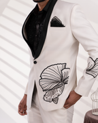 Macro shot showing fish embroidery on white tuxedo