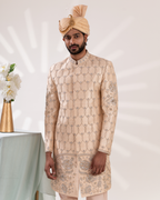 Frontal shot showing classic ivory sherwani with fine embroidery