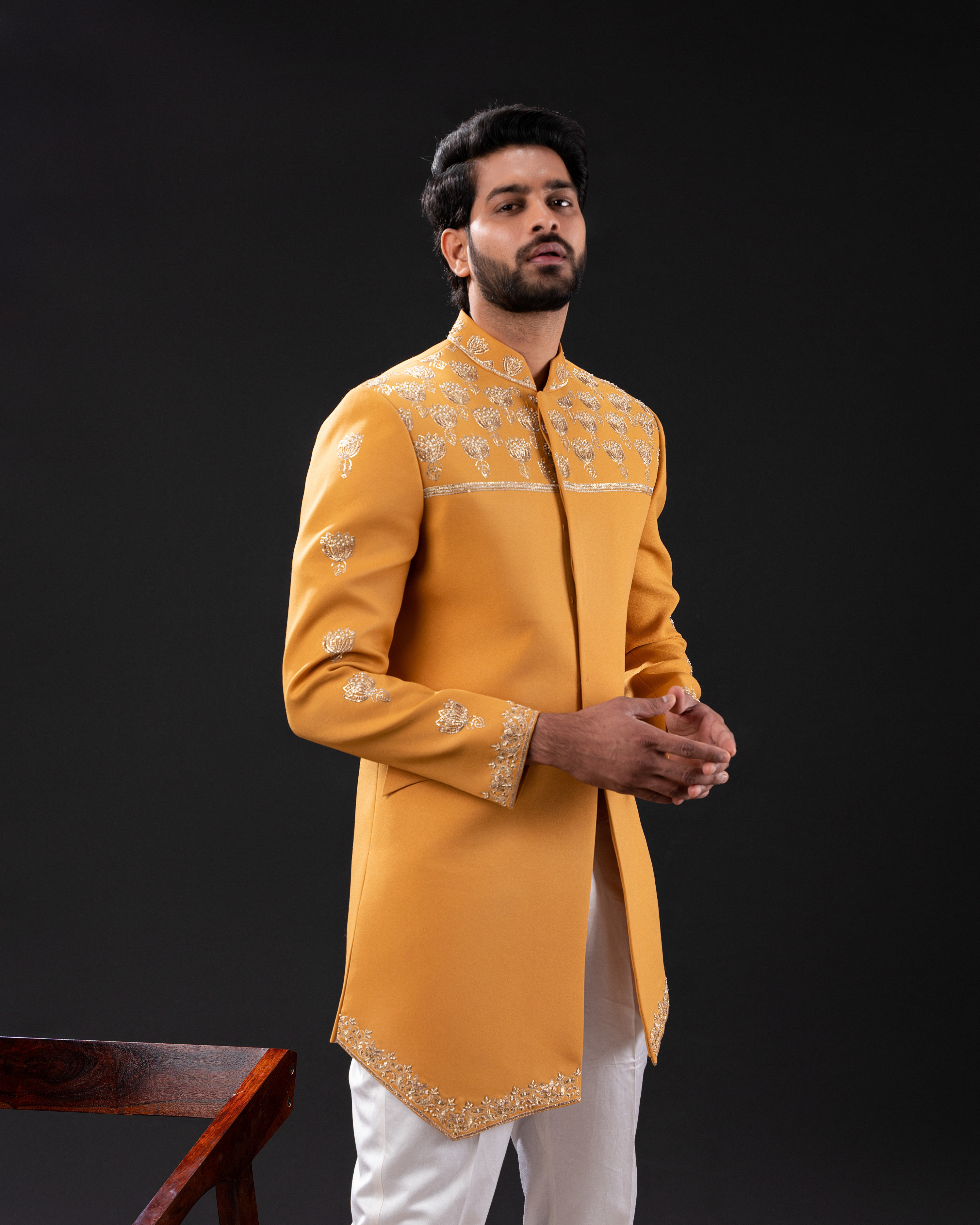Yellow embroidered bandhgala with white pants 