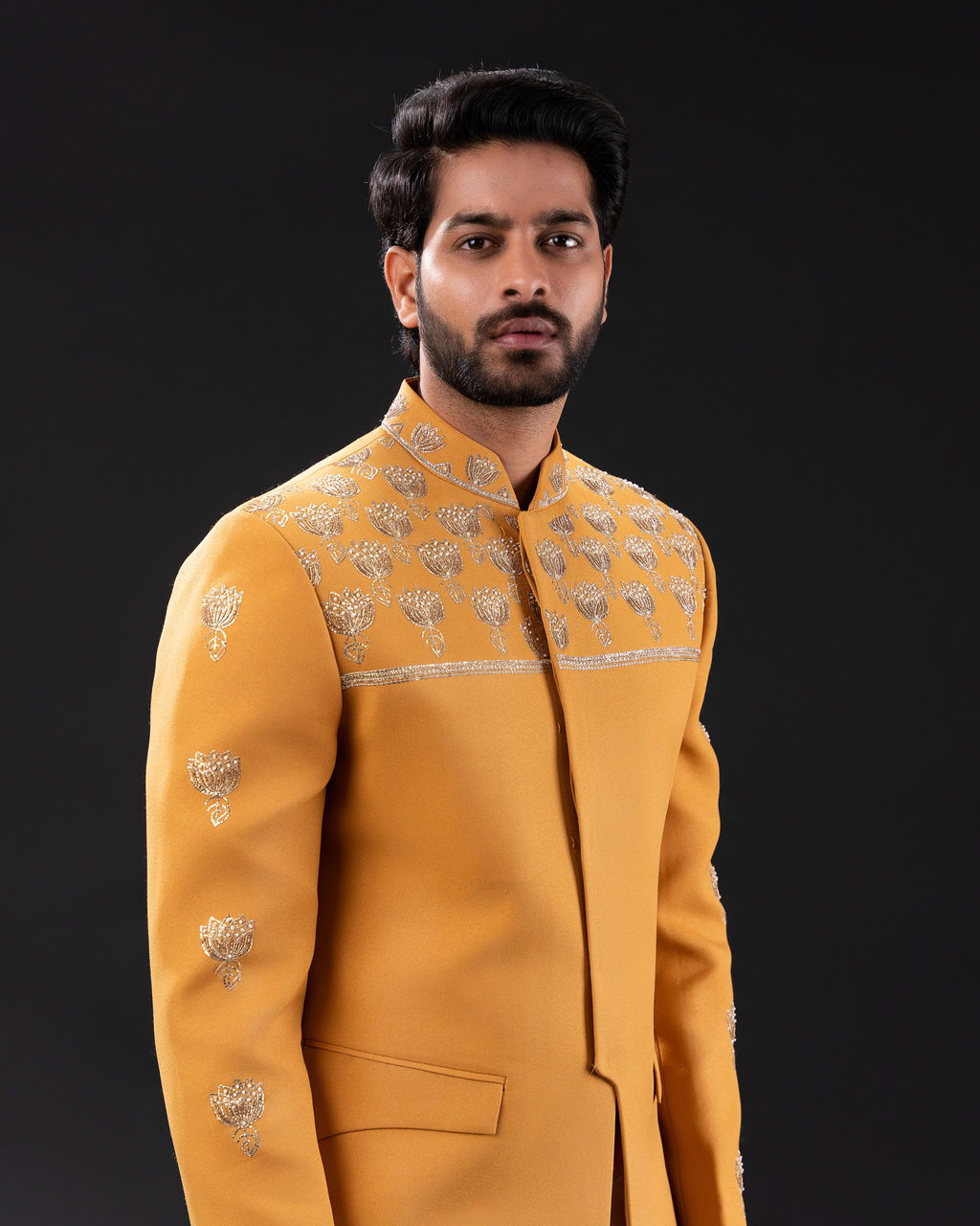 Frontal shot showcasing the warm mustard tone and clean silhouette of embroidered bandhgala