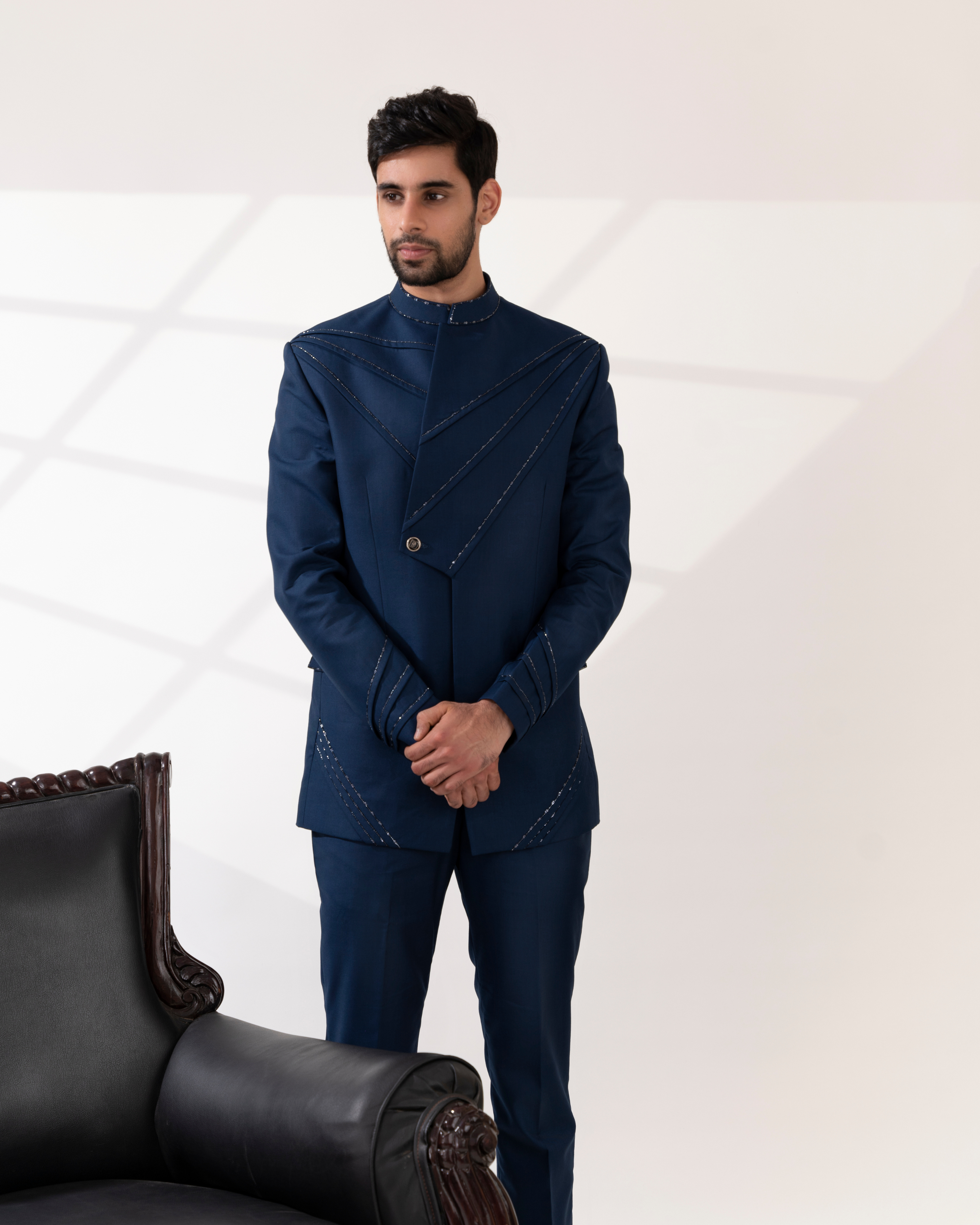 Frontal shot showcasing deep navy tones and sleek construction of bandhgala.