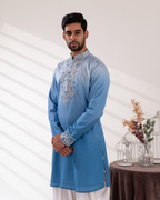 Front angle capturing the soft transition of the kurta blues across the set.