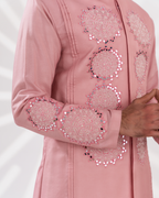 Close-up of threadwork on sherwani and sleeve