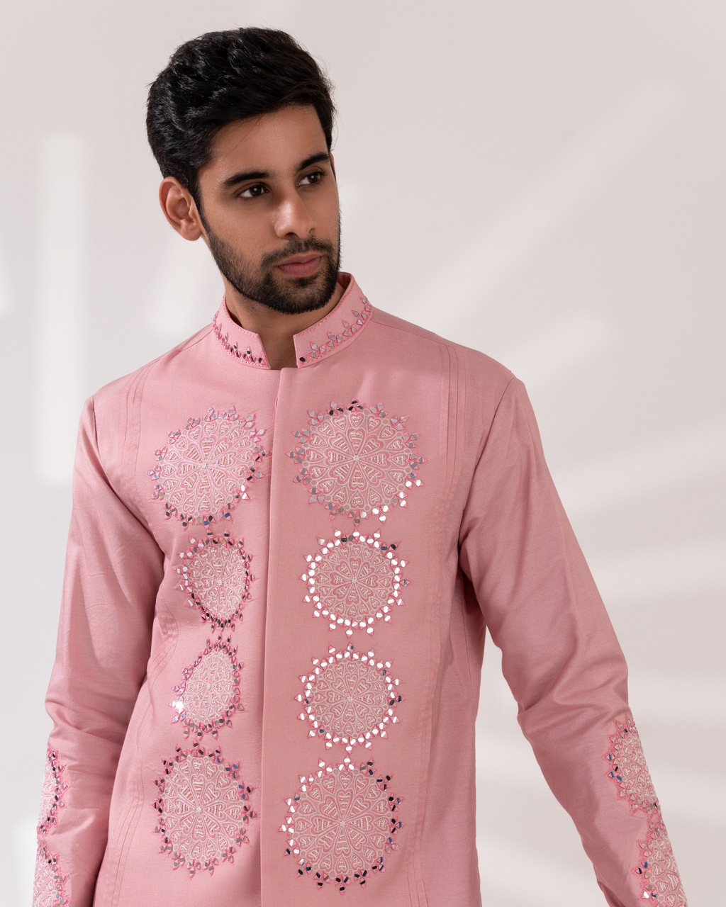 Front angle showing the embroidery on sherwani 