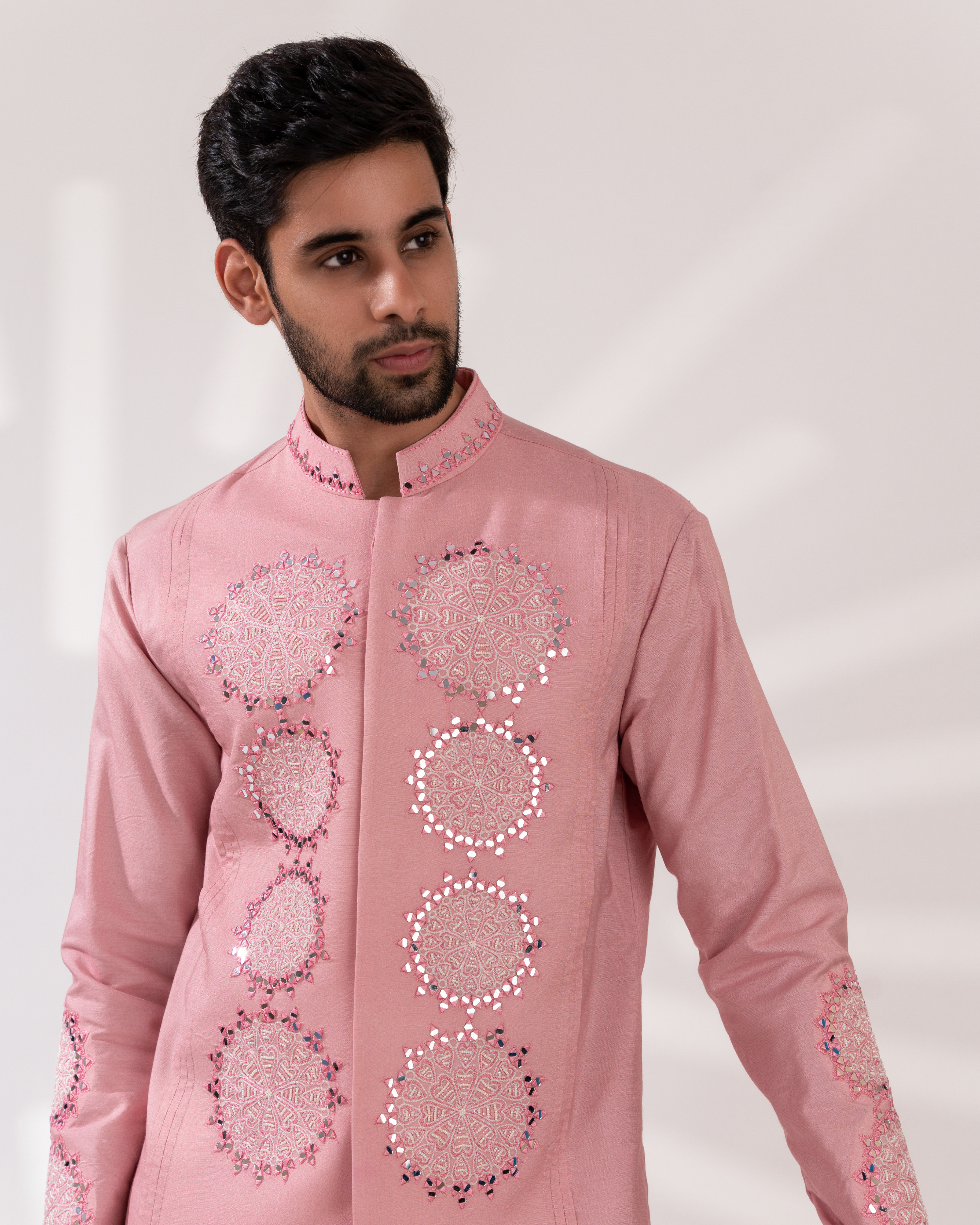 Front angle showing the embroidery on sherwani 