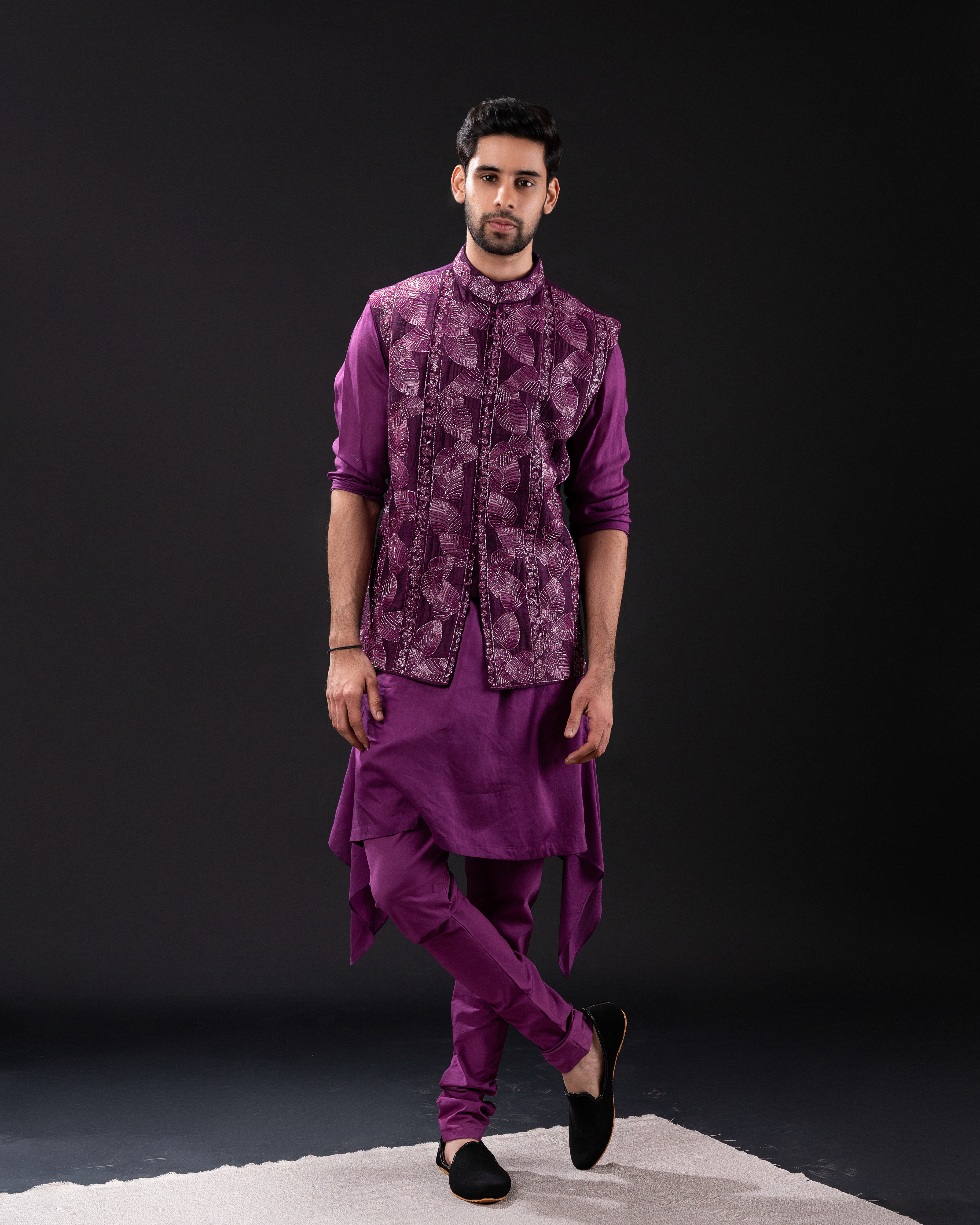 Front view of a bold purple Bundi set with palm-leaf embroidery