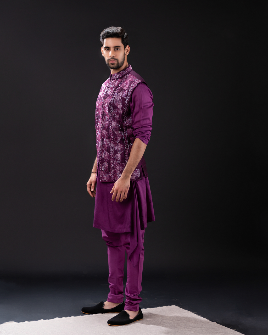 Side view showing the bundi kurta set with chudi pants