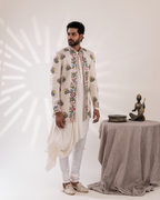 Side view showing jacket and kurta drape with white pants