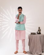 Front view of an aqua and peach Bundi set with a clean festive silhouette.