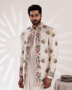 Close-up of botanical embroidery on the sherwani.