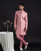 Full front view showing the elegant salmon sherwani silhouette.