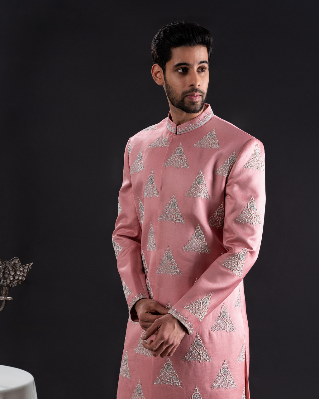 Front angle highlighting sherwani fit and pearl accents embroidery